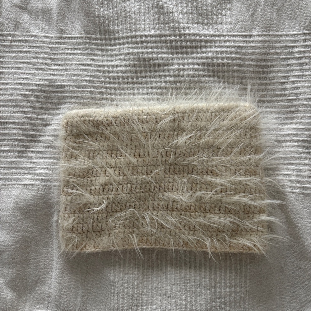UO Cream Fuzzy Knit Hat